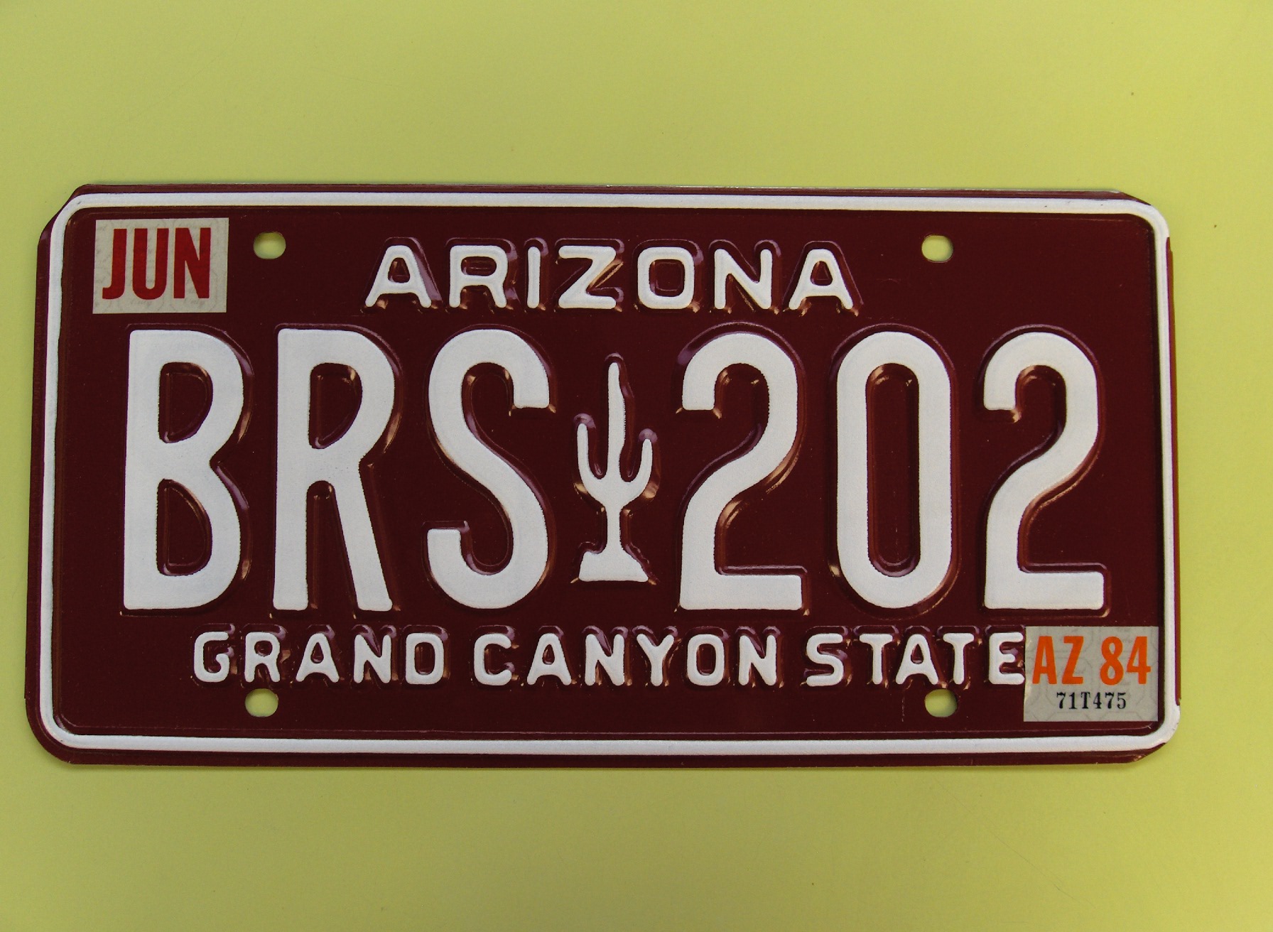 AZ_1982-__TYPE2-MEDIUM-NAME_LARGE-SLOGAN-&-RECESSED-BORDER