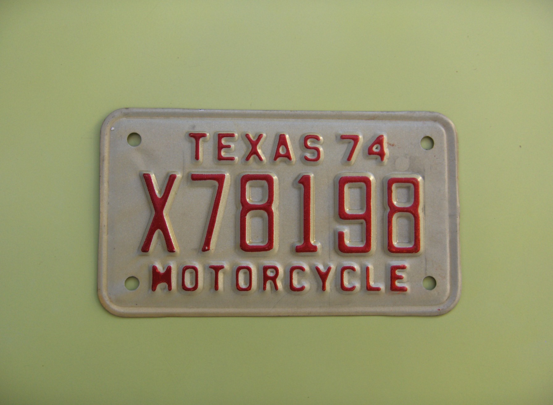 TX_MC_1974-1975_TYPE1_FULL_STATE_NAME_UNPAINTED_DEB_BORDER_FB